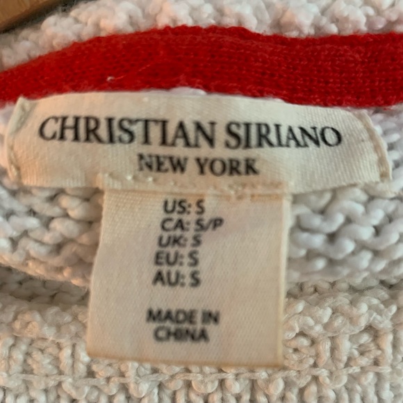 Like new- size small but wears like a medium knit sweater - Picture 2 of 2